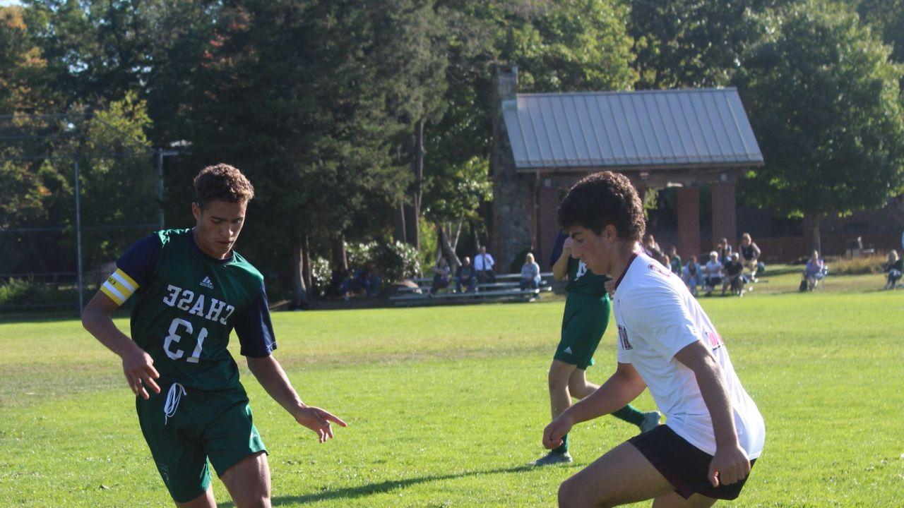 Chase Collegiate Captain Jaiden Paniagua Dribbles Ball Against Wooster.jpg